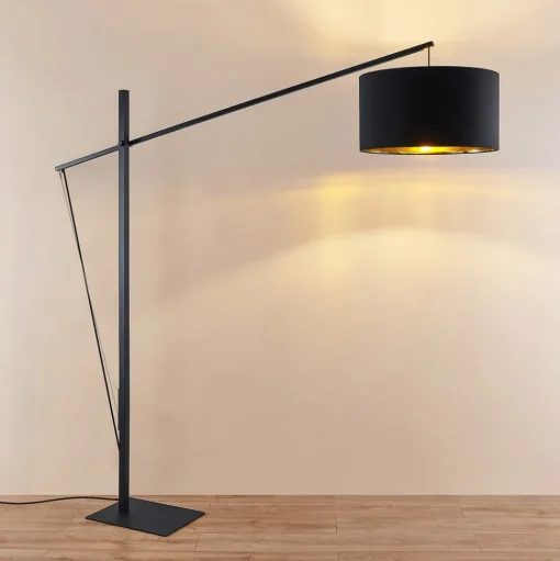 Arcchio gebogen vloerlamp Mossa, 200 cm, zwart-goud, textiel