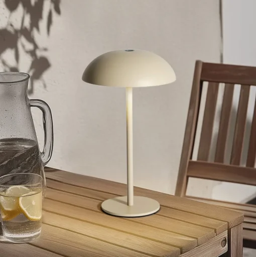 Arcchio LED oplaadbare tafellamp Thenra, beige, muurbeugel