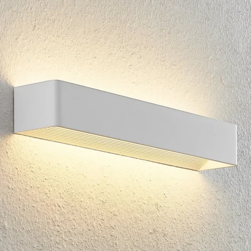 Arcchio LED wandlamp Karam, 53 cm, wit, metaal, omhoog/omlaag