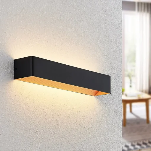 Arcchio LED wandlamp Karam, 53 cm, zwart, metaal, omhoog/omlaag