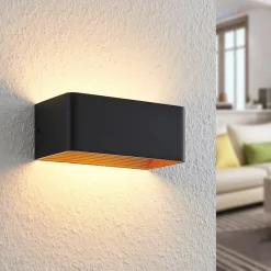 Arcchio LED wandlamp Karam, 20 cm, zwart, metaal, omhoog/omlaag
