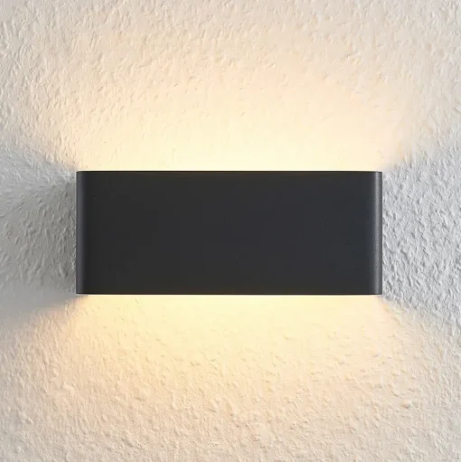 Arcchio LED wandlamp Karam, 20 cm, zwart, metaal, omhoog/omlaag
