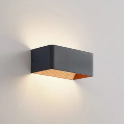 Arcchio LED wandlamp Karam, 20 cm, zwart, metaal, omhoog/omlaag