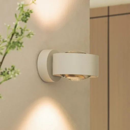 Arcchio LED wandlamp Rotari, lens, omhoog/omlaag, wit, metaal
