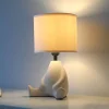 JUST LIGHT. Ted tafellamp, keramiek, zittend, zandbeige