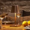 LED oplaadbare tafellamp Nuindie mini, USB-C, brons, IP54, dimbaar.
