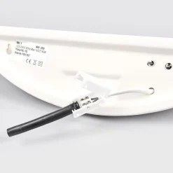 Lichte wandlamp van gips, beschilderbaar