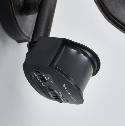 Lindby buitenwandlamp Daphne, antiek zwart, sensor, E27