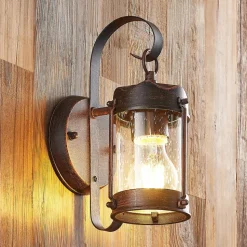 Lindby buitenwandlamp Farly, roestbruin, aluminium, 17cm