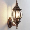 Lindby buitenwandlamp Nadesha, hoogte 47 cm, geborsteld goud