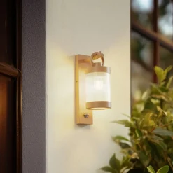 Lindby buitenwandlamp Yrene, 20 cm, beige, sensor, ribbel