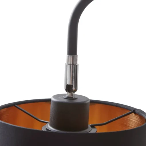 Lindby Hinay textiel-vloerlamp zwart/goud