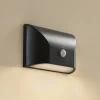 Lindby LED buiten wandlamp Siana, zwart, PC, sensor