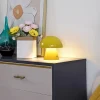 Lindby LED oplaadbare tafellamp Nevijo, geel, Ø18cm, USB, dimmer
