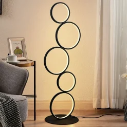 Lindby LED vloerlamp Jacek, zwart, metaal, 110 cm, ringen