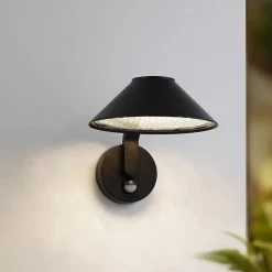 Lindby LED wandlamp Capelo, zwart, aluminium, sensor, Ø20cm