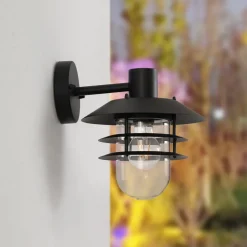 Lindby Meliora buitenwandlamp, zwart, ijzer, IP44, E27