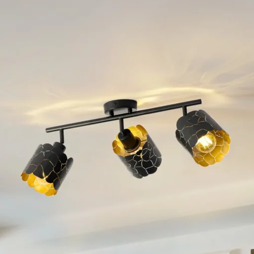 Lindby plafondlamp Aralena, zwart/goud, 3-lamps, lengte 70cm