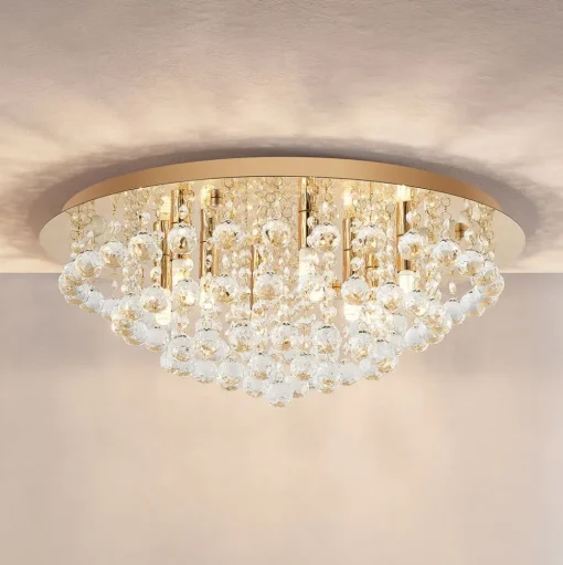 Lindby plafondlamp Gillion, 8-lamps, goud, kristal, Ø 55cm