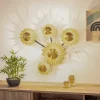 Lindby Senmia wandlamp in goud, 5-lamps