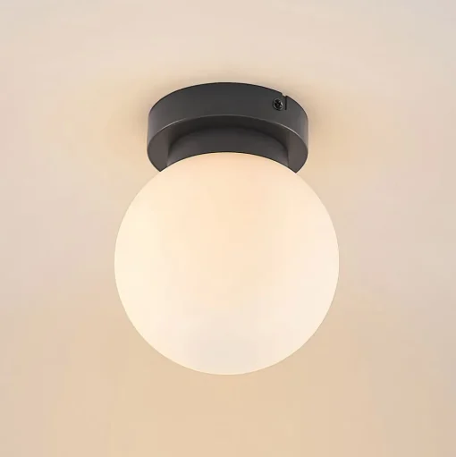 Lindby Tavino plafondlamp, bolvormige kap, zwart