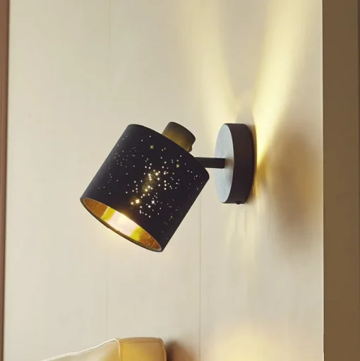 Lindby wandlamp Vasilia, Ø 12 cm, zwart/goud, stof