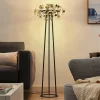 Lucande Glimmo LED vloerlamp, zwart, messing