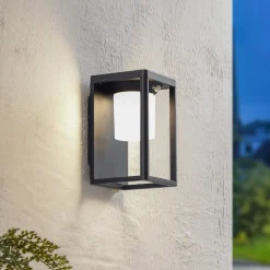Lucande LED wandlamp Tilena, zwart, aluminium, sensor