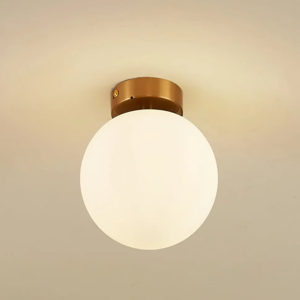 Plafondlamp Lucande Bidolo, messingkleurig, glas, 15 cm, IP44