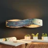 Quitani LED wandlamp Lian, geoxideerd, dimbaar