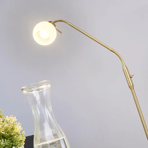 Vloerlamp Lindby Elaina, messingkleurig, 162cm, flexibel, E14