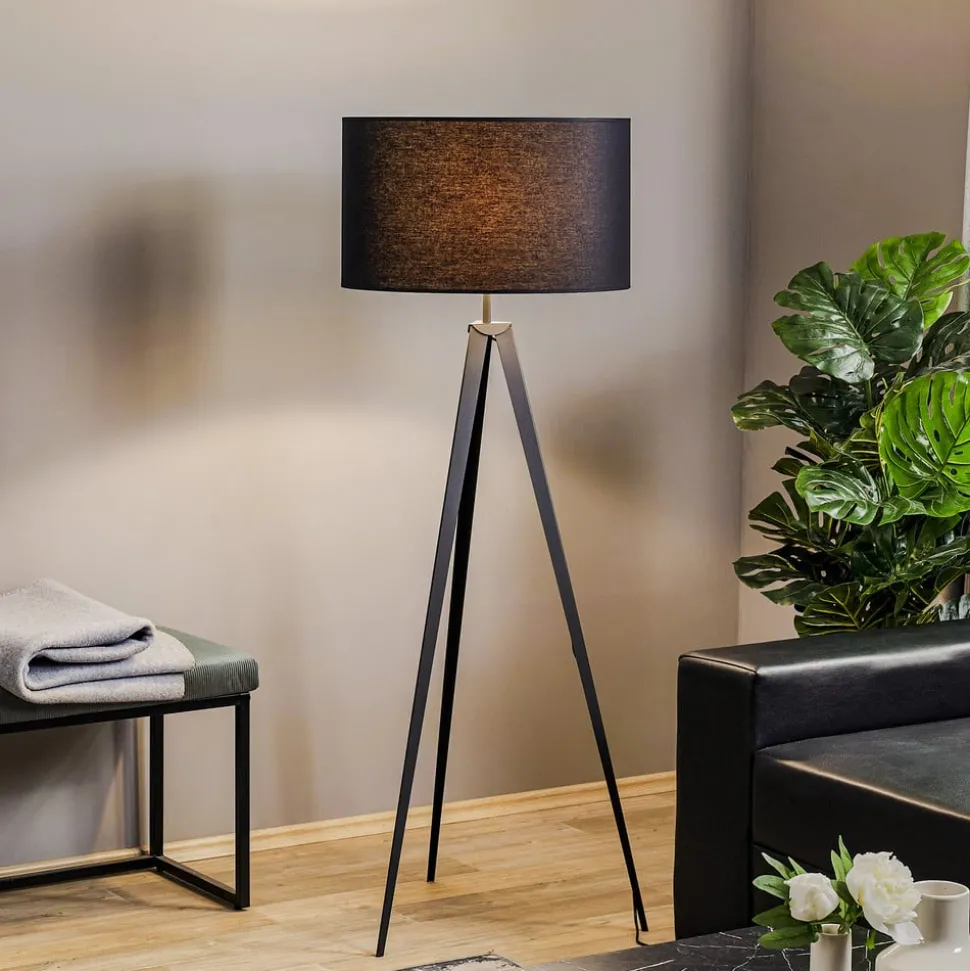 Vloerlamp Tago, driepoot, kap zwart/goud